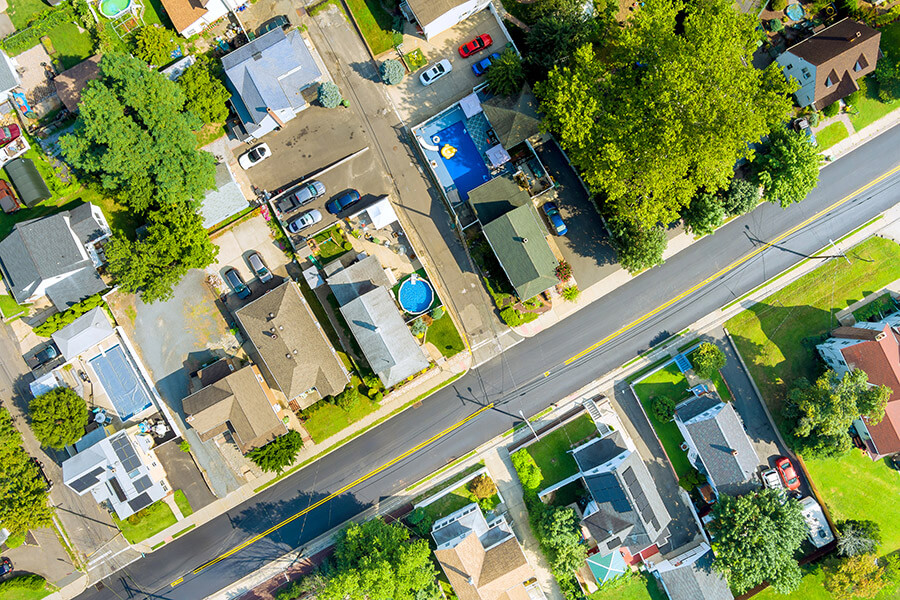 aerial-view-of-suburban-neighborhood-showcasing-ho-2025-03-27-03-44-50-utc (1)